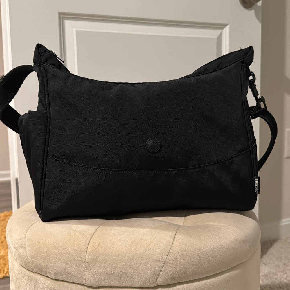 Pacsafe anti-theft cross-body bag.